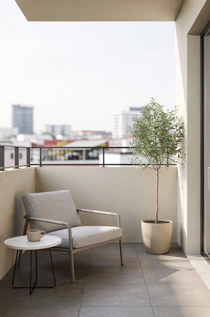 minimalist balcony with lounge chair and potted plant in a clean modern small balcony design